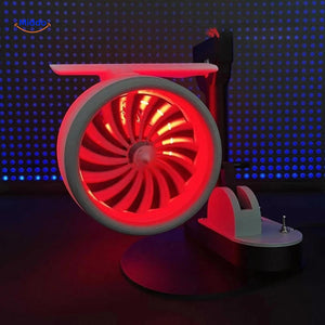 Handmade Jetfan turbofan fan glowing in dark atmospheric lighting.