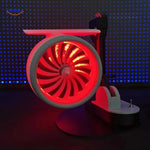 Handmade Jetfan turbofan fan glowing in dark atmospheric lighting.