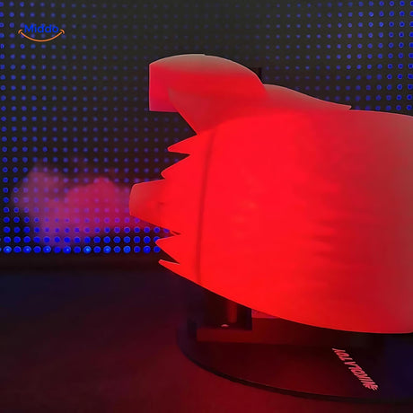 Jetfan turbofan with glowing red tail flame illuminated in dark ambient light.