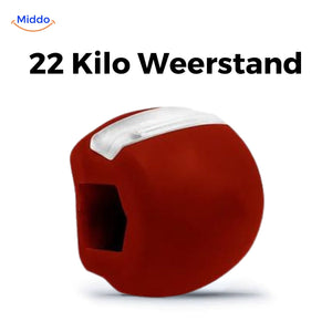 Red silicone KaakMaster Pro 22kg jaw trainer for facial slimming and jaw definition.
