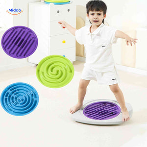 Child developing coordination skills with replaceable balance game discs
