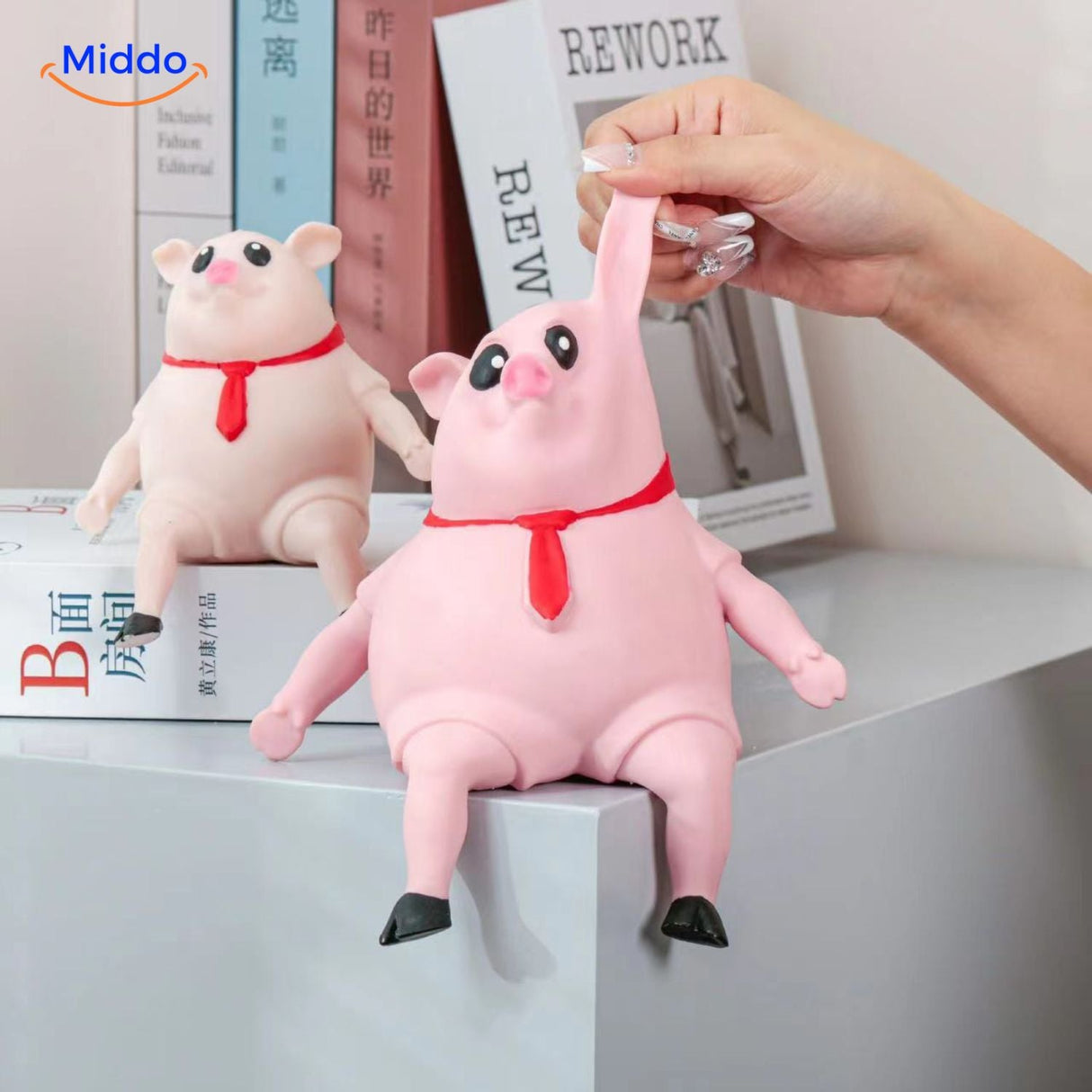 LalaPig relaxation toy in a playful lying pose for fidget and stress relief.