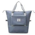 Large capacity blue expandable travel bag that folds for compact storage.