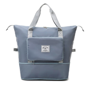 Large capacity blue expandable travel bag that folds for compact storage.