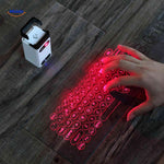 Laser projection keyboard displayed on table with hand interaction.