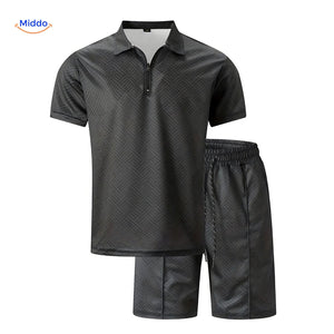 Leander summer set in black including lightweight shirt and drawstring shorts ensemble.