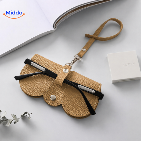 Compact glasses case featuring elegant leather construction for secure eyewear storage.