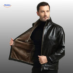 Black leather jacket with luxe fur-lined collar and interior.