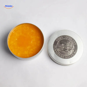 Leather-restoring balm packaging displaying product name and usage instructions.