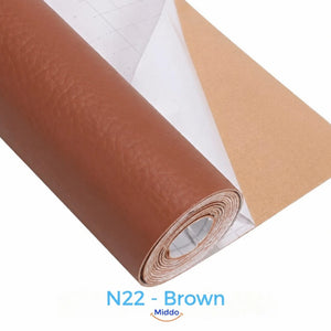 LeatherRestore self-adhesive faux leather repair patch in N22 - Brown, showing the textured surface and backing.