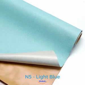 LeatherRestore self-adhesive faux leather repair patch in N5 - Light Blue, showing the textured surface and backing.