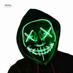 Model wearing green LED light-up mask for costume showcase.