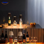 Design LED table lamp with three adjustable brightness settings for ambiance.