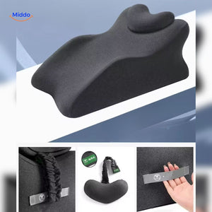 Black leg elevation pillow with adjustable strap for secure and custom positioning.