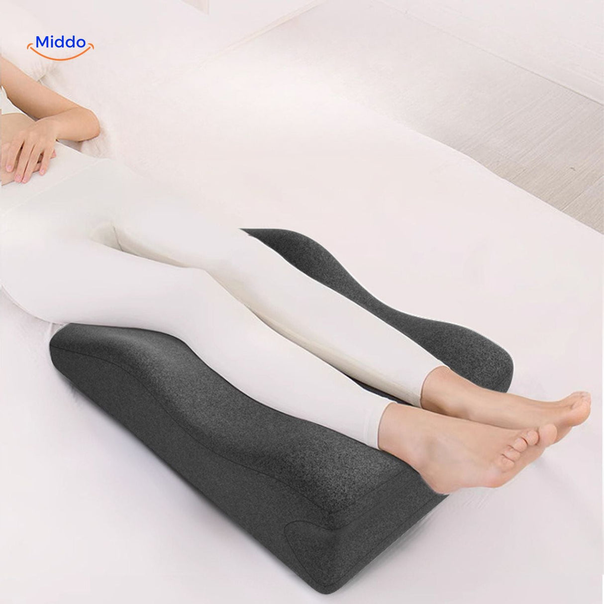 Leg elevation pillow designed specifically for foot and lower leg support positioning.