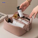 Light beige cosmetic travel bag for toiletries
