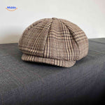 Light brown plaid wool vintage newsboy cap with comfortable fit.
