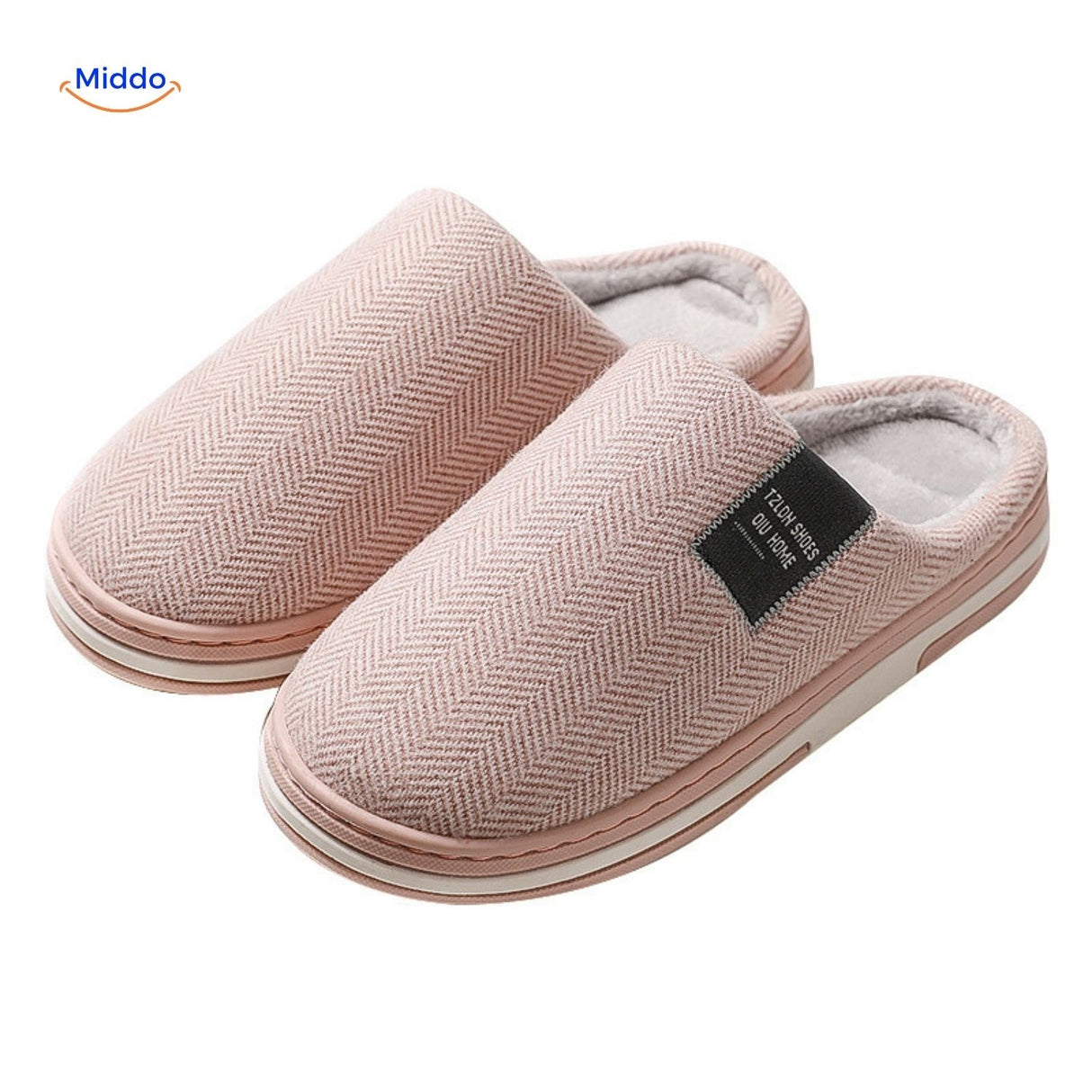 Close-up detail of light pink soft cotton slippers.