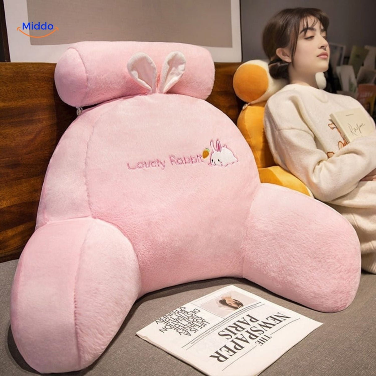 ComfyBack lumbar support pillow in orange with toast design shown from side angle.