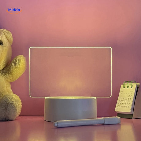 Horizontal light panel memo board with bear design and calendar on LumiNote desk lamp.
