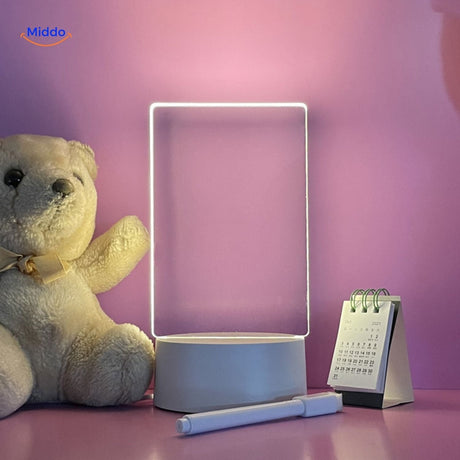 Vertical erasable memo board with bear and calendar design on LumiNote desk lamp.