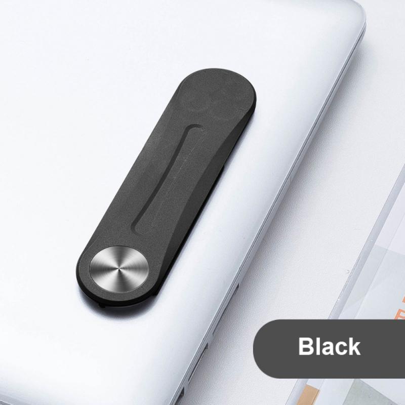 Black MagnetClip magnetic phone mount positioned on laptop for video conferencing.