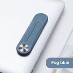 Fog blue MagnetClip phone mount installed on laptop for hands-free second screen.