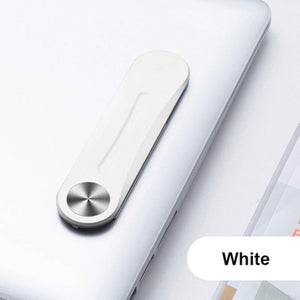 White MagnetClip magnetic phone holder mounted on laptop for secondary screen use.