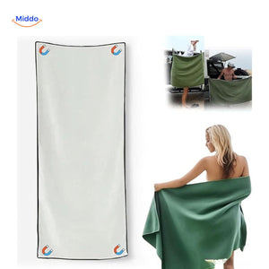 White sand-free microfiber towel with magnetic corner attachment system.