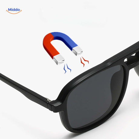Close-up of the magnetic attachment system showing how clip-on lenses snap onto the sunglasses frame.