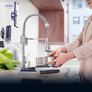 Kitchen-mounted magnetic phone holder for hands-free convenience