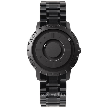 Closeup of magnetic watch showing detailed floating sphere pointer hands.