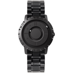 Closeup of magnetic watch showing detailed floating sphere pointer hands.