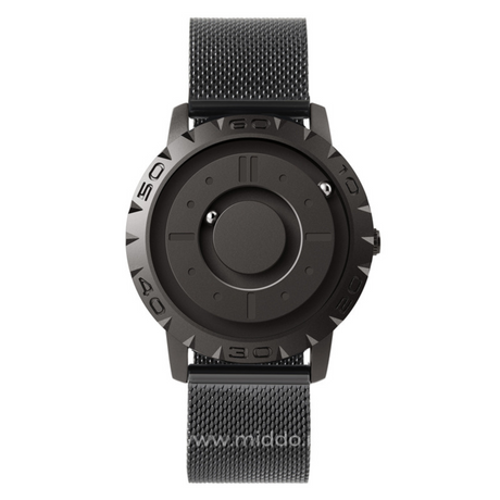 Magnetic watch featuring metal mesh band, sleek and versatile style.