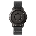 Magnetic watch featuring metal mesh band, sleek and versatile style.