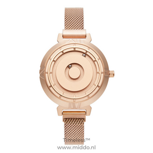 Women's rose gold magnetic watch with elegant mesh band design.