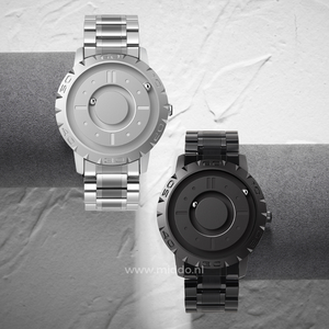 Two-tone magnetic watch combining silver and black modern design.