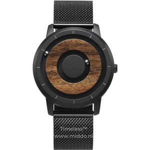 Black magnetic watch with warm wooden dial and natural accents.