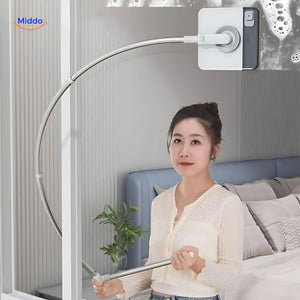 Magnetic window cleaner in action cleaning tall high-rise apartment windows safely and easily.