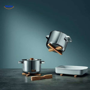 Magnetic wooden trivet with heat-resistant design, perfect for protecting tabletops.