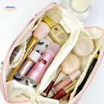Makeup travel pouch packed with hygiene and cosmetic items