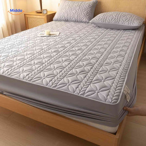 Mattress protector with elastic corners and stretchable sides for secure fit.