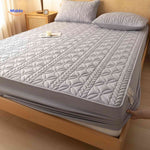 Mattress protector with elastic corners and stretchable sides for secure fit.