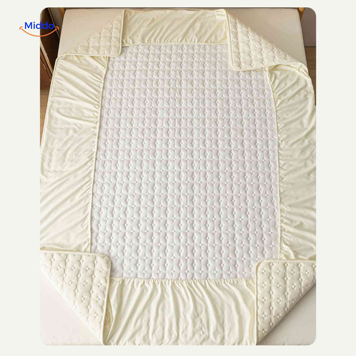 Mattress protector with full corner coverage and elastic straps for secure fit.