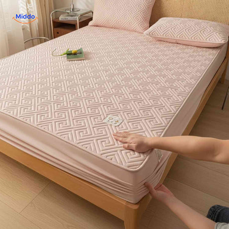 Thin quilted top layer mattress protector offering comfort and waterproof protection.
