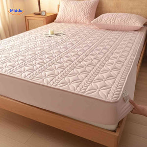 Mattress protector with premium quilted top layer for enhanced protection and comfort.