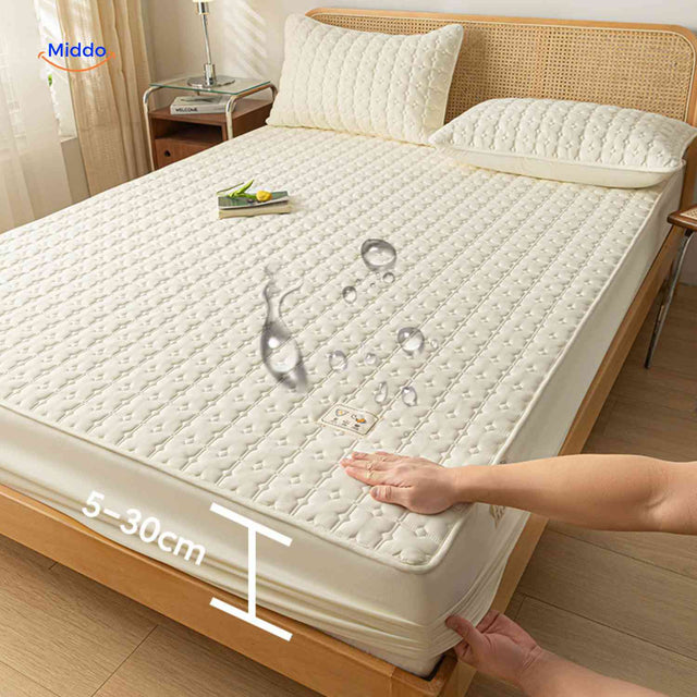 Waterproof mattress protector with breathable quilted design and elastic corner fit.