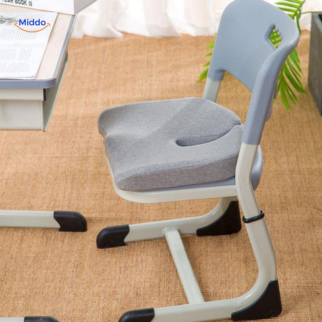 Memory foam seat cushion with stretchy and durable fabric cover for enhanced comfort.