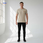 Beige summer t-shirt with smiley design worn in relaxed men's casual style.