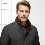 Quilted jacket in black with brown trim and soft collar finish.
